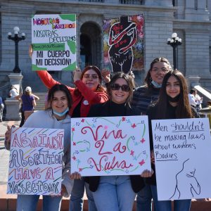 Our Youth of COLOR at the Womxn’s March Denver on the steps of the Colorado State Capitol.