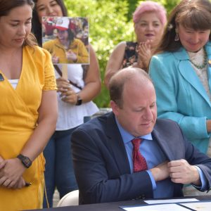 Governor Jared Polis sign SB9 into Colorado law.